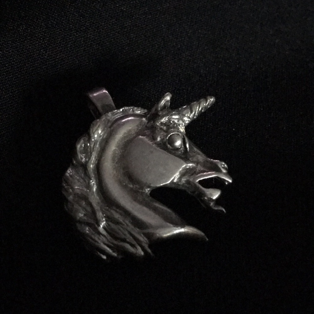 T M 1982 silver tone Unicorn pendant